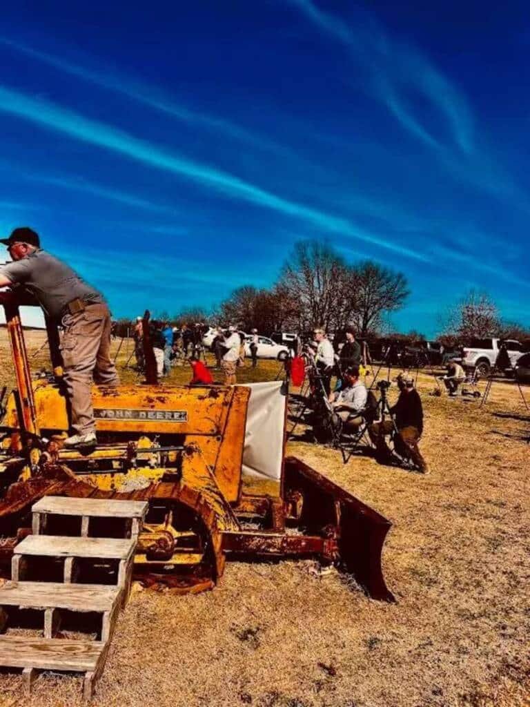 Group of shooters and spectators attending a rifle competition at Recon By Fire in Oklahoma